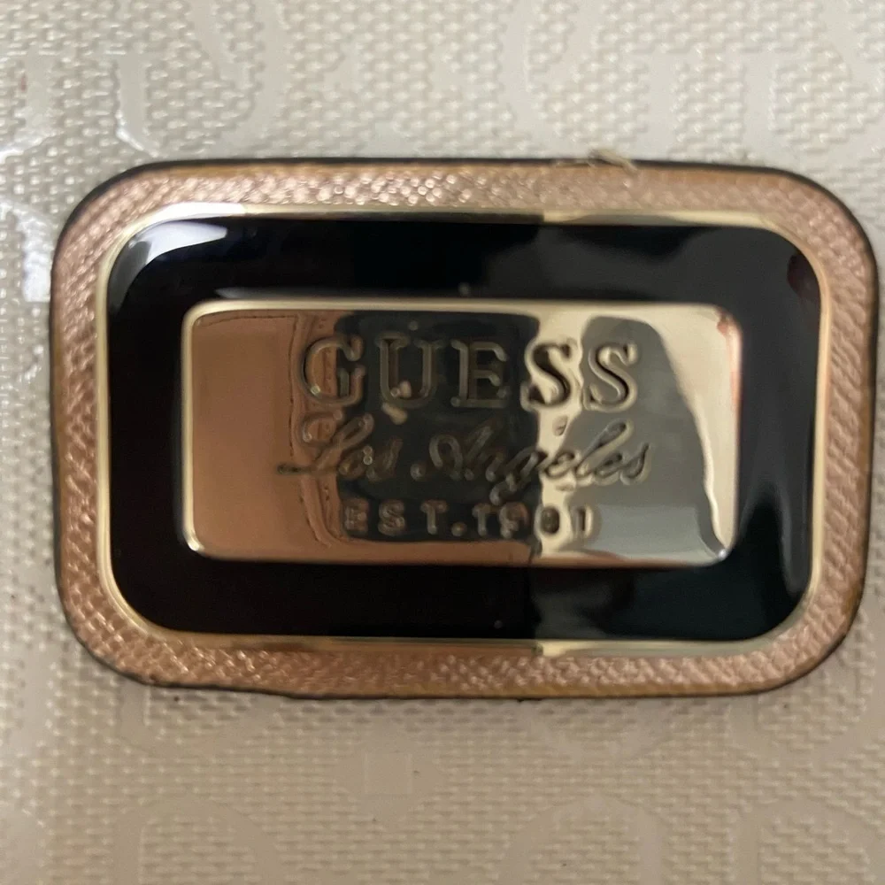 Guess purse cream w black flowers useful but well loved $49